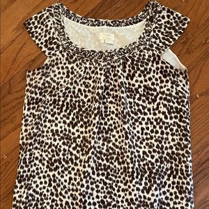 Kate Spade leopard print silk blouse with cap sleeves.